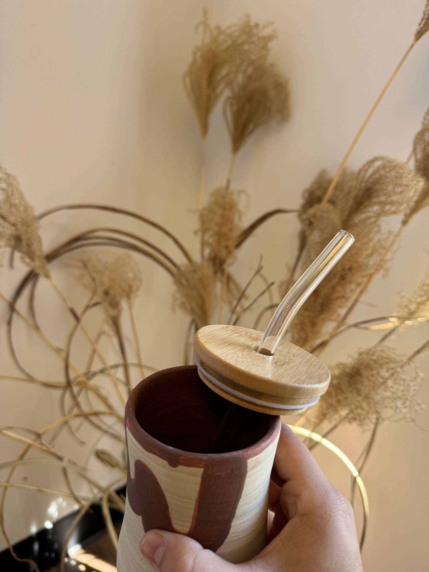 Handmade pottery cup with top